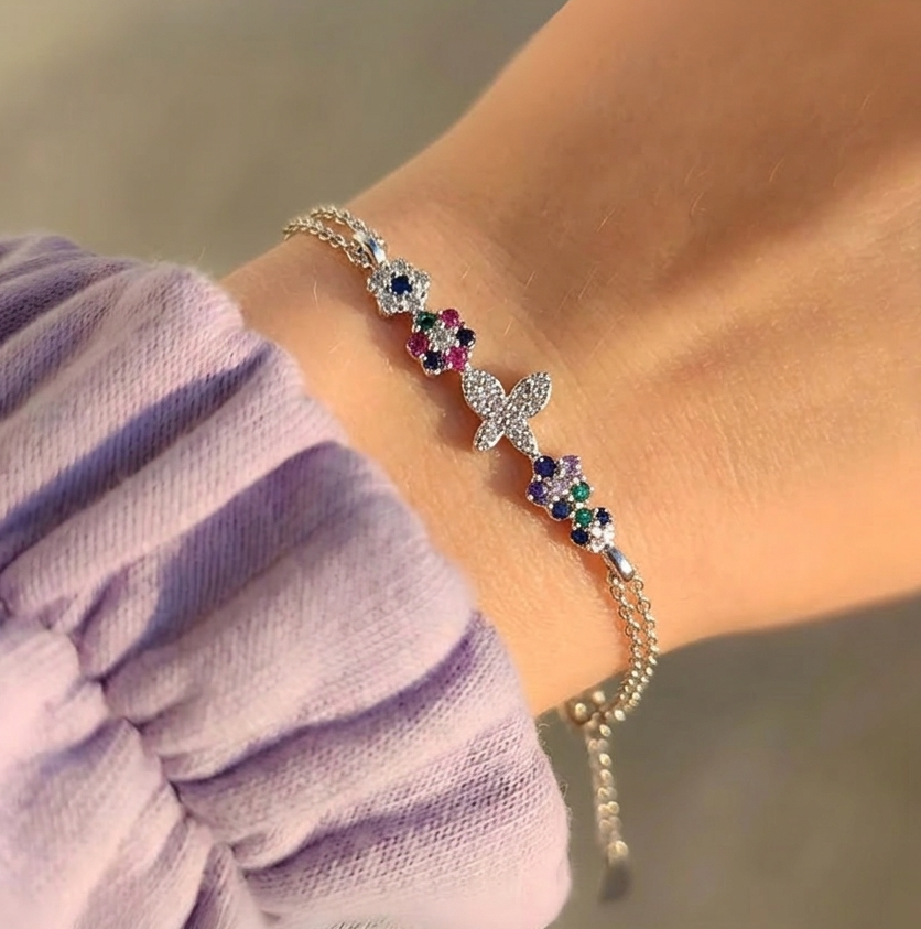 Pulsera de mariposas y flores