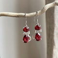 Aros de gato con circones rojos