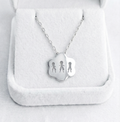 Collar con colgante tres hijos
