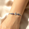 Pulsera de mariposas y flores