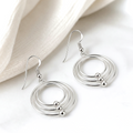 Aros colgantes triple argolla