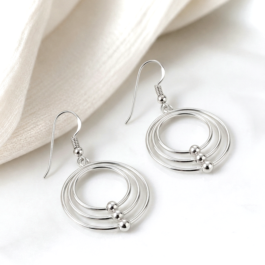 Aros colgantes triple argolla
